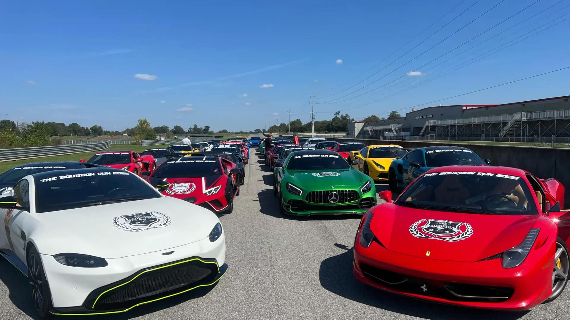 Rally cars lined up on track